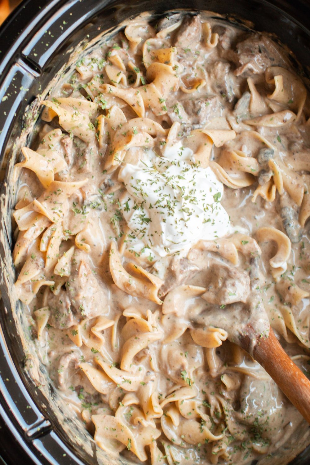 close up of beef stroganoff in a crockpot.