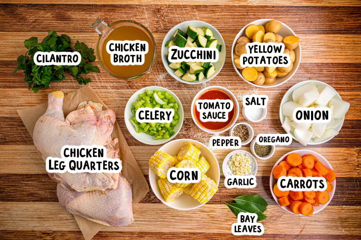 Ingredients for caldo de pollo on a table.