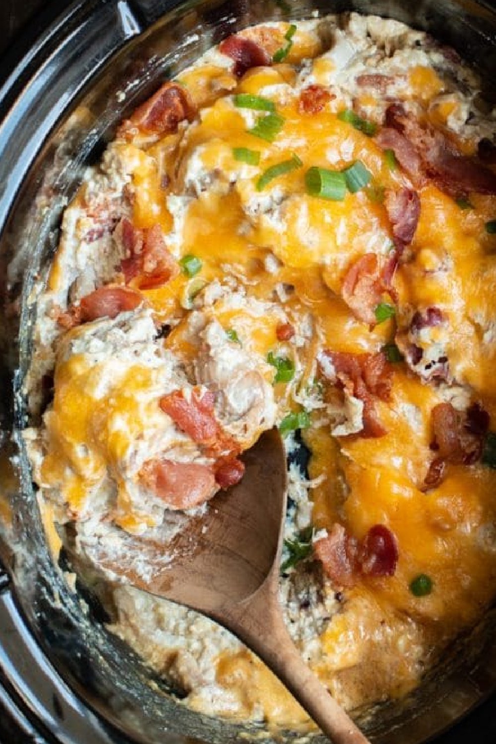 CRACK CHICKEN in a slow cooker.