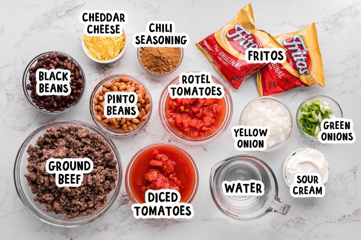 ingredients for slow cooker frito pie on a table.