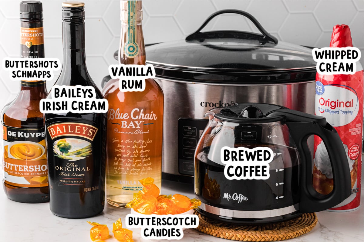 Ingredients for slow cooker hot buttered rum coffee on a table.