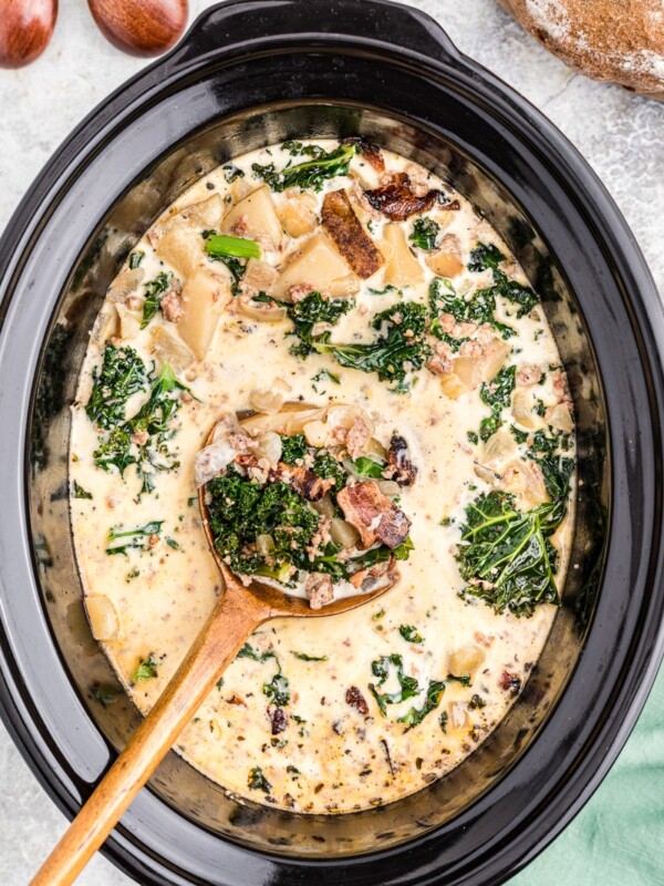 cooked zuppa toscana with spoon in it.